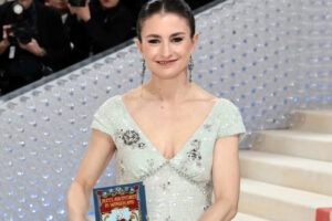 Woman posing at a red carpet or fashion event